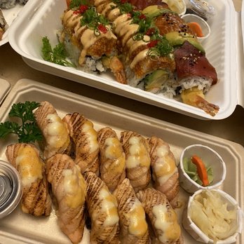 Hanki Sushi - two trays of food on a table - Sushi Bars Near Me - Markham, Ontario