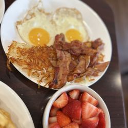 Coral Springs Diner - Eggs hashbrowns bacon and fruit that came with the French toast