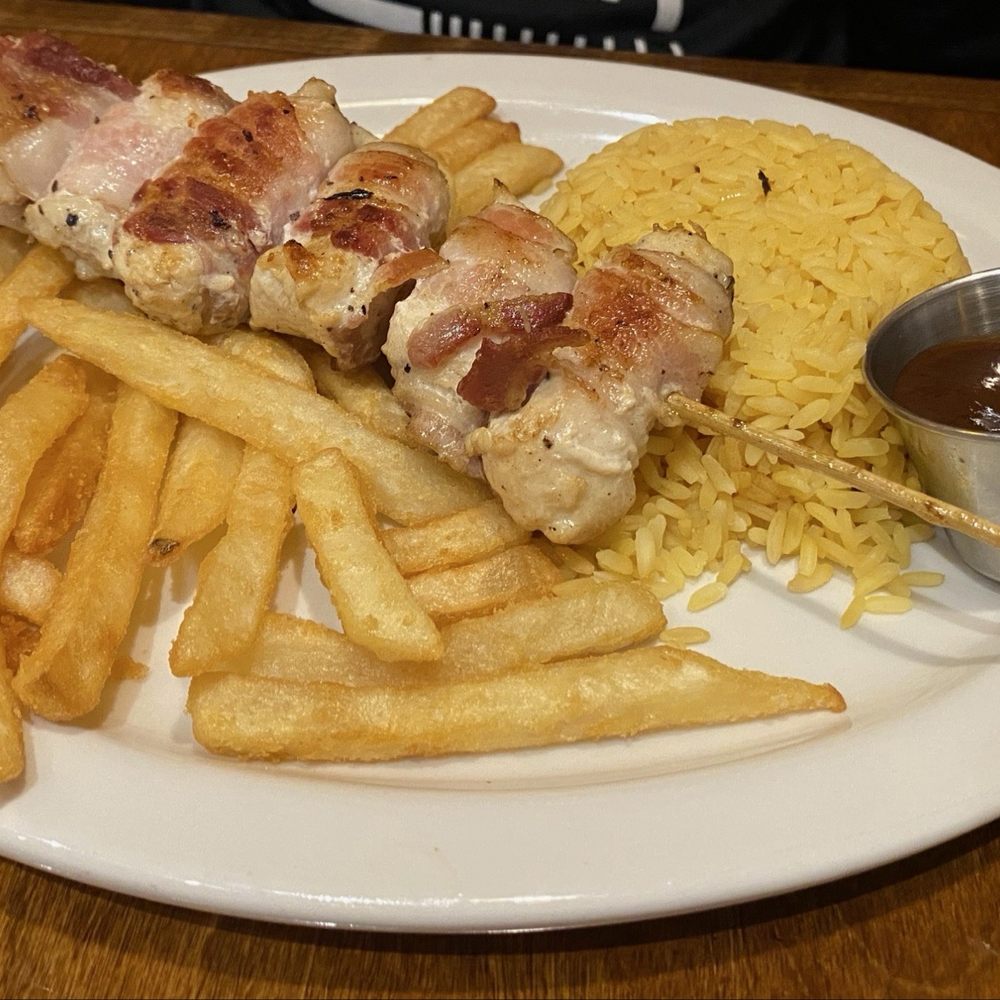 Gaucho’s Fire Restaurant - Bacon wrapped chicken skewers. - Brazilian Near Me - Indianapolis, Indiana Gaucho’s Fire Restaurant - Bacon wrapped chicken skewers. - Brazilian Near Me - Indianapolis, Indiana