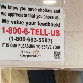 McDonald's - a sign on the wall of a restaurant - Burgers Near Me - Atmore, Alabama
