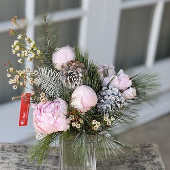 Orchids Little Secret Boutique - Pink Peonies & Pinecone Winter Elegance Cube Vase Arrangement! Available at Orchids Little Secret Boutique! - Florists Near Me - Placentia, California Orchids Little Secret Boutique - Pink Peonies & Pinecone Winter Elegance Cube Vase Arrangement! Available at Orchids Little Secret Boutique! - Florists Near Me - Placentia, California