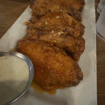 The Brick Kitchen + Lounge - Honey garlic sriracha wings - Beer Bar Near Me - Renton, Washington The Brick Kitchen + Lounge - Honey garlic sriracha wings - Beer Bar Near Me - Renton, Washington