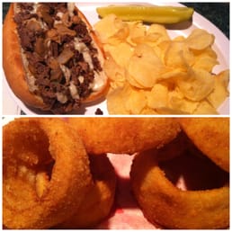 Philly Cheese Steak sandwich, onion rings Philly Cheese Steak sandwich, onion rings