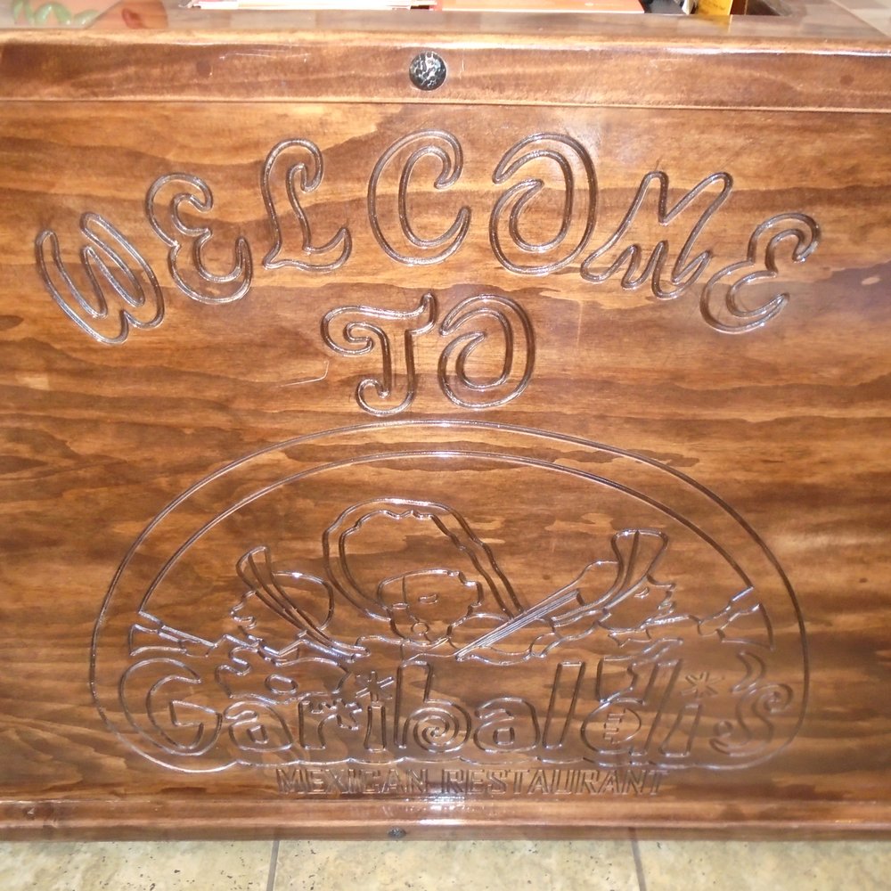 Garibaldi's Mexican Restaurant - A cool carved wood front desk. - Mexican Near Me - New Richmond, Wisconsin Garibaldi's Mexican Restaurant - A cool carved wood front desk. - Mexican Near Me - New Richmond, Wisconsin