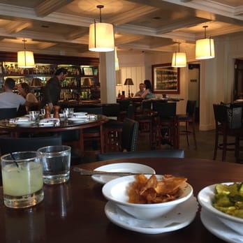 Chicago q - The bar area with the courtesy bBQ chips and bread and butter pickles! This is gonna be good! - Barbeque Near Me - Chicago, Illinois