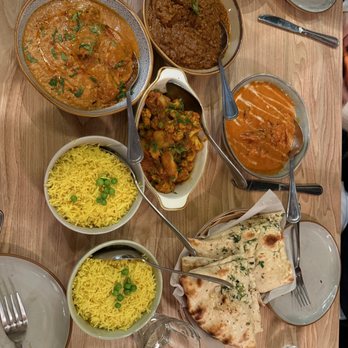 Noor Indian Fusion Kitchen - Butter chicken, muglai chick changezi, aloo gobhi, baigan bharta, garlic naan, and golden rice - Indian Near Me - Berkeley, California Noor Indian Fusion Kitchen - Butter chicken, muglai chick changezi, aloo gobhi, baigan bharta, garlic naan, and golden rice - Indian Near Me - Berkeley, California