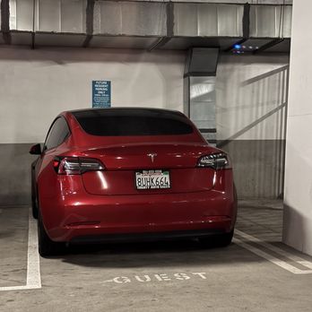 Vivere Flats - Luxury Apartments - Red Tesla that always reuses THE SAME guest pass/permit. - Apartments Near Me - Anaheim, California