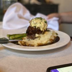 Steak with crab cake mash potatoes and asparagus