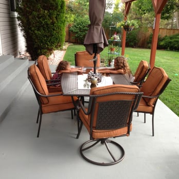 Primetime Restoration - a patio with a table and chairs - General Contractors Near Me Primetime Restoration - a patio with a table and chairs - General Contractors Near Me