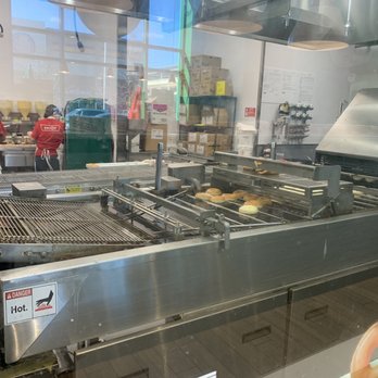 Krispy Kreme Doughnuts - Frying a fresh batch of donuts - Donuts Near Me - Staten Island, New York