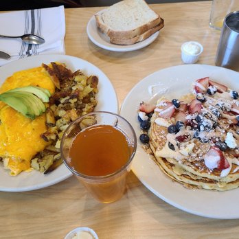Mimosa - Shrimp omelet with baked potatos. Blubbery pancakes with strawberry. And apple juice - Breakfast & Brunch Near Me - Brookfield, Wisconsin Mimosa - Shrimp omelet with baked potatos. Blubbery pancakes with strawberry. And apple juice - Breakfast & Brunch Near Me - Brookfield, Wisconsin