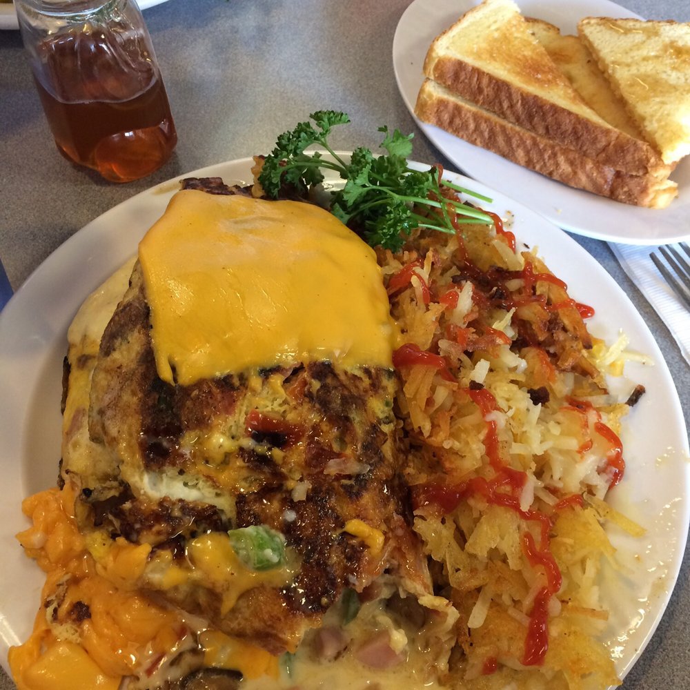 Joes Cafe - Pics don't convey the size of the omelette. Maybe a dozen eggs?? - Breakfast & Brunch Near Me - Orem, Utah