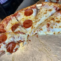 Half cheese, half pepperoni pizza Half cheese, half pepperoni pizza