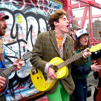 Williamsburg Bridge - Dead River Company playing on the Manhattan side of the Williamsburg Bridge. - Landmarks & Historical Buildings Near Me