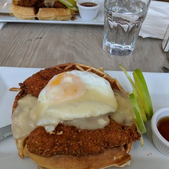 Westville Dumbo - Fried chicken and waffles, topped with a fried egg, gravy, and apple slices. - Comfort Food Near Me - Brooklyn, New York Westville Dumbo - Fried chicken and waffles, topped with a fried egg, gravy, and apple slices. - Comfort Food Near Me - Brooklyn, New York