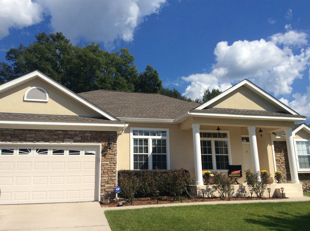 Slide of Total Quality Roofing