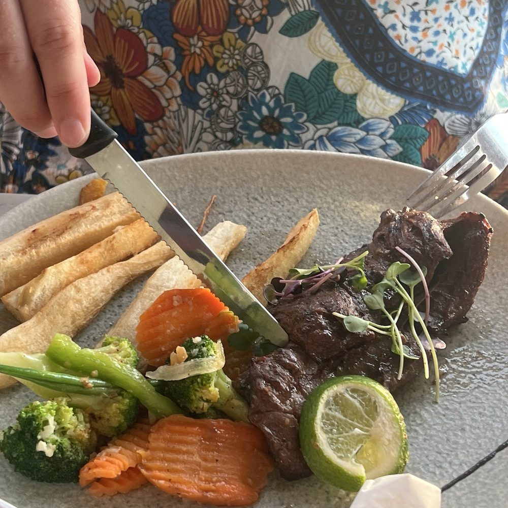 Guayabos Tropical Sunset - Skirt steak w yuca fries - Latin American Near Me - Aguada, Puerto Rico