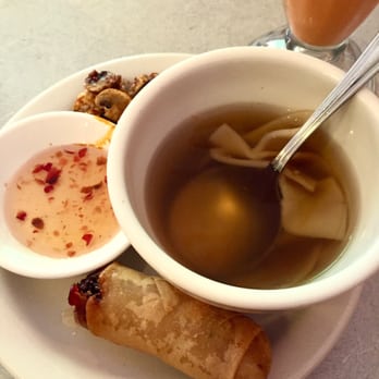 Thai Gourmet - Wonton soup and a spring roll that came with lunch. The mushrooms peeking out are from my brothers lemongrass soup. Haha - Thai Near Me - Pittsburgh, Pennsylvania Thai Gourmet - Wonton soup and a spring roll that came with lunch. The mushrooms peeking out are from my brothers lemongrass soup. Haha - Thai Near Me - Pittsburgh, Pennsylvania