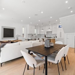 Paul Eviston - RE/MAX Select Properties - The living room of our newest listing which boasts a gas range and new modern cabinets. For the best real estate experience call Paul.