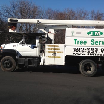 JM Tree & Landscape Service - a white utility truck - Tree Services Near Me - Browns Mills, New Jersey JM Tree & Landscape Service - a white utility truck - Tree Services Near Me - Browns Mills, New Jersey