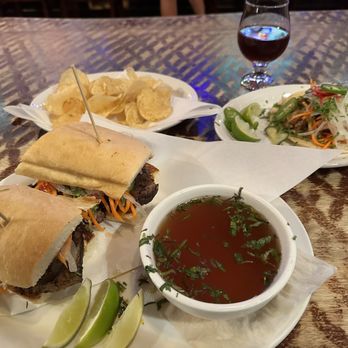 The Banshee - Braised brisket Pho-Rench Dip with chips and a Bahn Mi style pork taco. - Bars Near Me - Chico, California