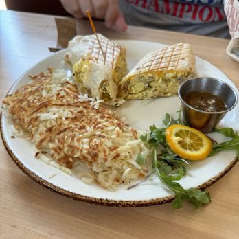 Brunch Time - Breakfast burrito with sausage with hash browns. - Breakfast & Brunch Near Me - Plano, Texas