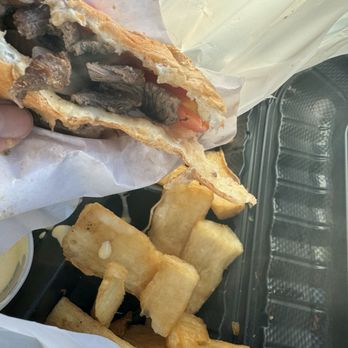 Raices Peruvian Cuisine - Lomo saltado sandwich Straight up steak in bread with a piece of tomato? - Peruvian Near Me - Manassas, Virginia Raices Peruvian Cuisine - Lomo saltado sandwich Straight up steak in bread with a piece of tomato? - Peruvian Near Me - Manassas, Virginia