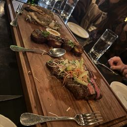 This was the main course. Steak (cooked perfectly), sweet potato, and branzino. This was the main course. Steak (cooked perfectly), sweet potato, and branzino.