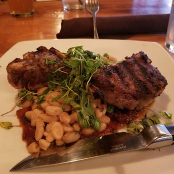 The Mill Steakhouse + Spirits - Lamb chops with beans, english peas and tomato jam - Sports Bars Near Me - Milton, Washington The Mill Steakhouse + Spirits - Lamb chops with beans, english peas and tomato jam - Sports Bars Near Me - Milton, Washington