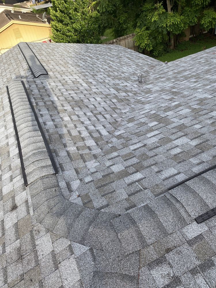 Slide of CB Roofing Construction