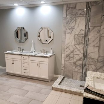 Design And Save - a large bathroom with a walk in shower - General Contractors Near Me - Cudahy, Wisconsin Design And Save - a large bathroom with a walk in shower - General Contractors Near Me - Cudahy, Wisconsin
