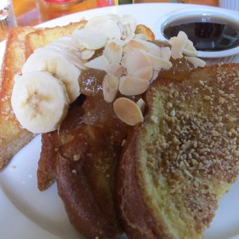 Sarabeth's Key West - Almond Crusted Cinnamon French Toast with apple marmalade and banana... no syrup required. - American Near Me - Key West, Florida Sarabeth's Key West - Almond Crusted Cinnamon French Toast with apple marmalade and banana... no syrup required. - American Near Me - Key West, Florida