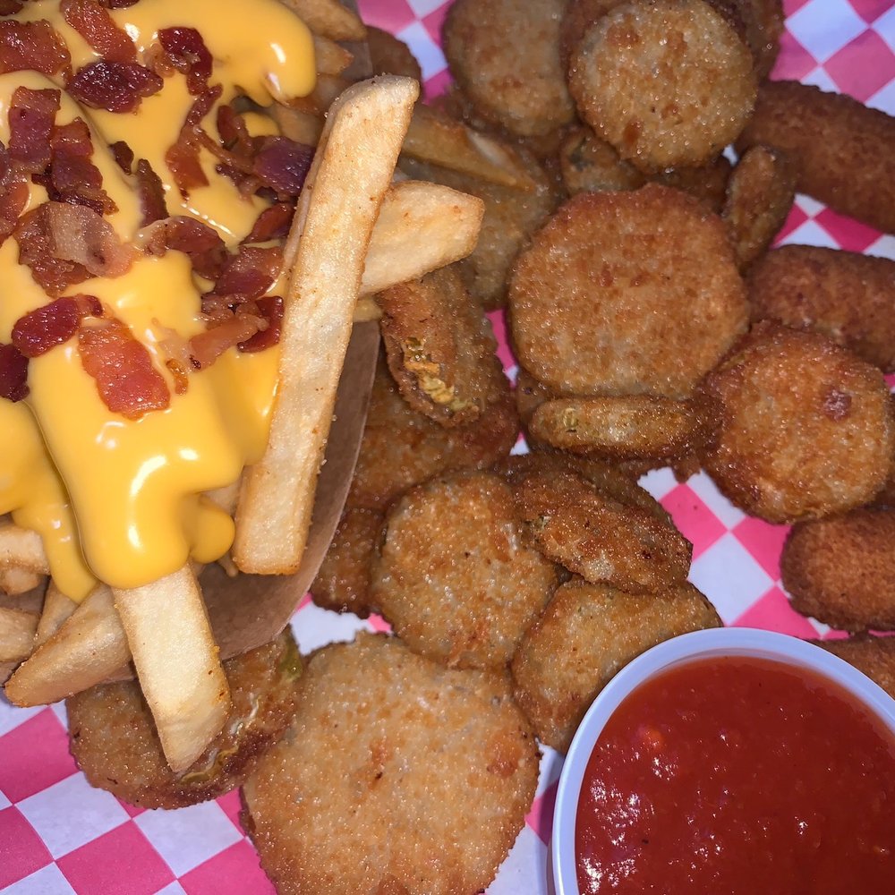 Appetizers! Cheese fries, fried pickles, and mozzarella sticks.