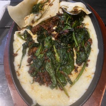 Mariscos El Malecon - Aperitivo Queso fundido súper rico  Appetizer Queso fundido (melted cheese with chorizo and spinach. Very flavorful. Delicious - Seafood Near Me - North Richland Hills, Texas