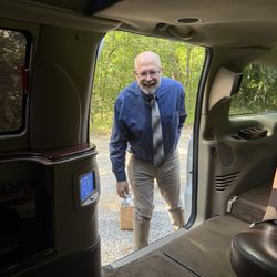 Legacy Executive Transportation - Best man entering Limo