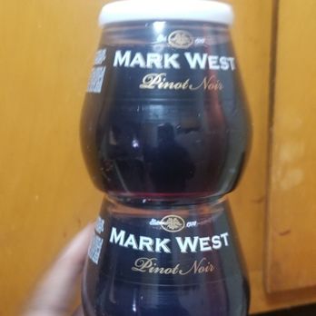 John's Brothers Liquor - a hand holding a glass of mark west - Beer, Wine & Spirits Near Me - Brooklyn, New York John's Brothers Liquor - a hand holding a glass of mark west - Beer, Wine & Spirits Near Me - Brooklyn, New York