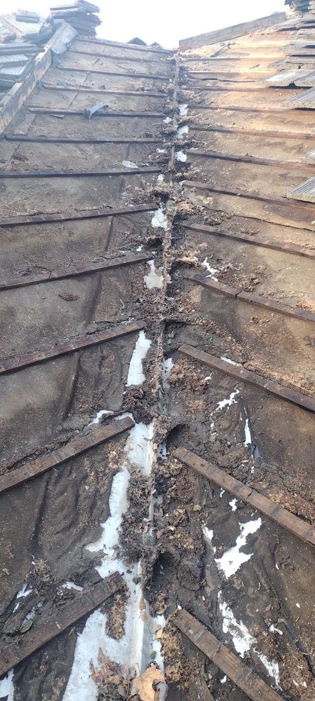 Slide of Echevarria Roofing