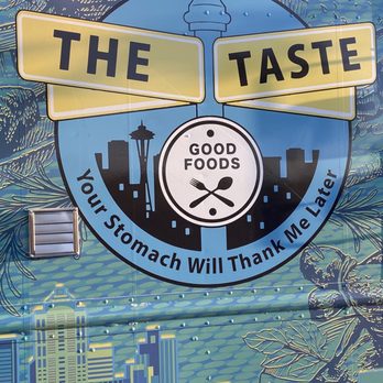 The Taste - a food truck with a city skyline in the background - Food Trucks Near Me