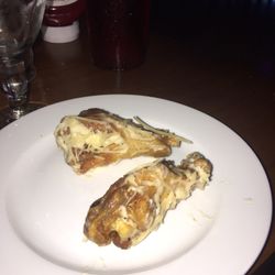 Global Sports Bar - Garlic parmesan wings at Global Sports Bar...questionable