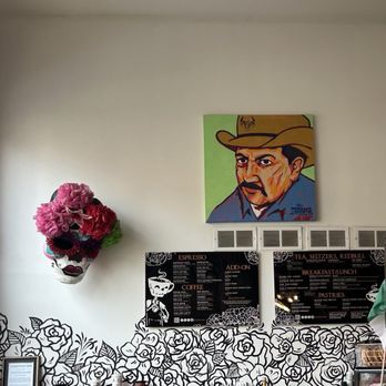 A Cup Of Joe - Bright white walls displaying evocative art. - Coffee & Tea Near Me - Chicago, Illinois A Cup Of Joe - Bright white walls displaying evocative art. - Coffee & Tea Near Me - Chicago, Illinois