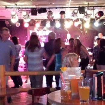 The Branding Iron - a group of people at a bar - Bars Near Me - Kennewick, Washington The Branding Iron - a group of people at a bar - Bars Near Me - Kennewick, Washington