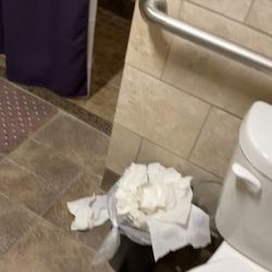 Anytime Fitness - Trash that is too all overt the floor