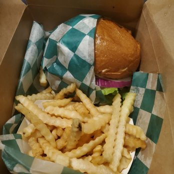 Halal Wings Plus - Neatly packaged burger with fries. Thousand island sauce buried somewhere beneath there I think. - Burgers Near Me - San Francisco, California