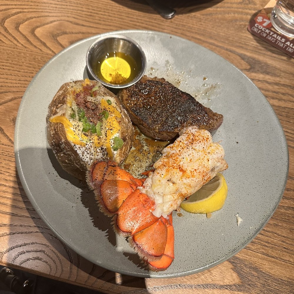 Outback Steakhouse - Sirloin steak (6 oz) with a lobster tail and a loaded bake potato! - Steakhouses Near Me - Schaumburg, Illinois Outback Steakhouse - Sirloin steak (6 oz) with a lobster tail and a loaded bake potato! - Steakhouses Near Me - Schaumburg, Illinois