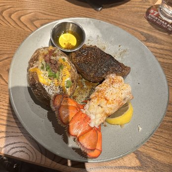 Outback Steakhouse - Sirloin steak (6 oz) with a lobster tail and a loaded bake potato! - Steakhouses Near Me - Schaumburg, Illinois Outback Steakhouse - Sirloin steak (6 oz) with a lobster tail and a loaded bake potato! - Steakhouses Near Me - Schaumburg, Illinois