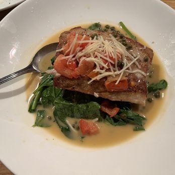 Village Tavern - Hemingway Florentine - Fresh catch (Mahi) pan-seared in lemon butter and white wine, tomatoes, capers, over sauteed spinach with parmesan - New American Near Me - Alpharetta, Georgia Village Tavern - Hemingway Florentine - Fresh catch (Mahi) pan-seared in lemon butter and white wine, tomatoes, capers, over sauteed spinach with parmesan - New American Near Me - Alpharetta, Georgia