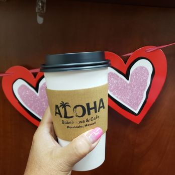 Aloha Bakehouse & Cafe - a hand holding a coffee cup - Coffee & Tea Near Me - Honolulu, Hawaii Aloha Bakehouse & Cafe - a hand holding a coffee cup - Coffee & Tea Near Me - Honolulu, Hawaii