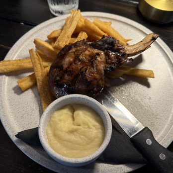 Wick n Ore Kitchen &Tap - 12oz. Bone-in Pork Chop - Burgers Near Me - Vernon Hills, Illinois Wick n Ore Kitchen &Tap - 12oz. Bone-in Pork Chop - Burgers Near Me - Vernon Hills, Illinois