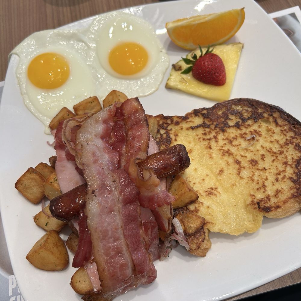 Canadian Breakfast: 2 eggs, bacon, ham, sausage , P&S potatoes, with French Toast. Also comes with side of Toast (not shown). Canadian Breakfast: 2 eggs, bacon, ham, sausage , P&S potatoes, with French Toast. Also comes with side of Toast (not shown).