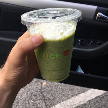 Juice 2 U Organic Kitchen - a hand holding a green smoothie - Juice Bars & Smoothies Near Me - Pompano Beach, Florida Juice 2 U Organic Kitchen - a hand holding a green smoothie - Juice Bars & Smoothies Near Me - Pompano Beach, Florida